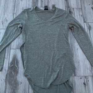 long green shirt that you can tuck into a skirt